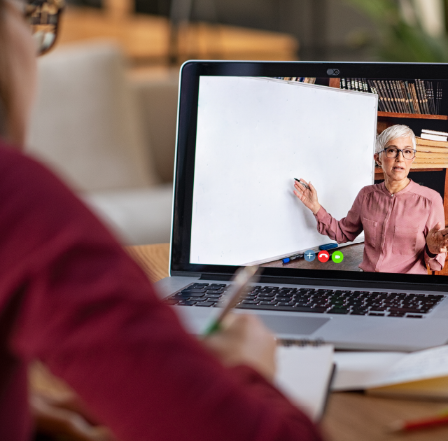 Student viewing online training on laptop