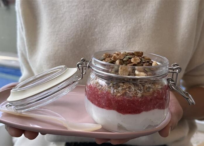 Vanilla Lemon Greek Coconut Yoghurt with Strawberry Sauce and cinnamon toasted nuts/seeds